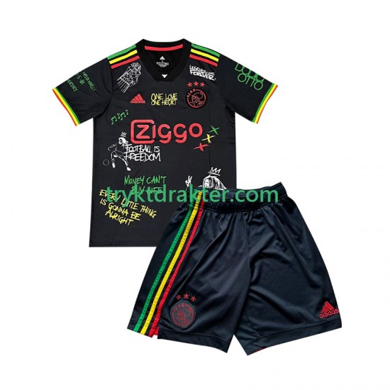 3-13 år Barn AFC Ajax drakt Bob Marley Special Hjemme 2025-2026 Svart Korte Ermer